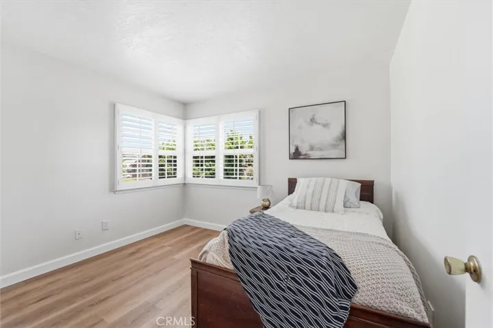 Upstairs bedroom with custom shutters