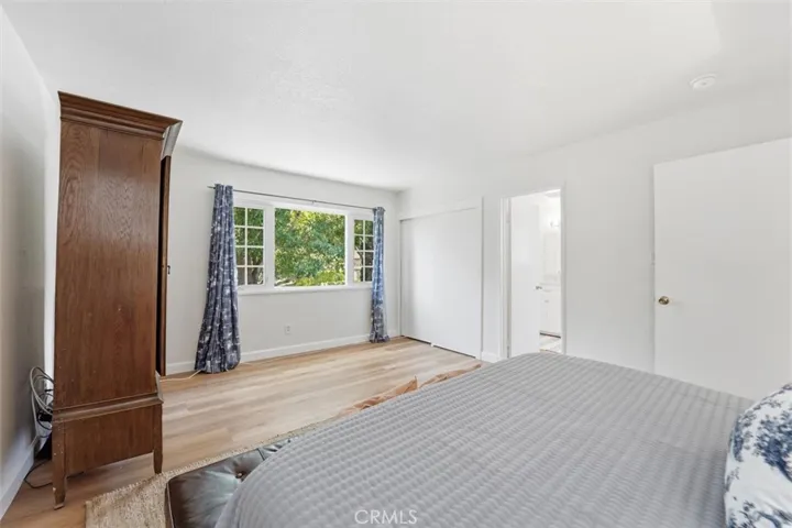 Primary bedroom with large picture window