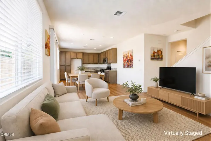 Grand room with furniture and note