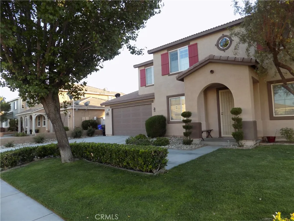 Mature trees and professionally landscaped front and rear yard