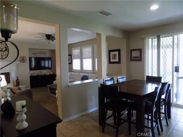 View of family room and dining area when coming into the home