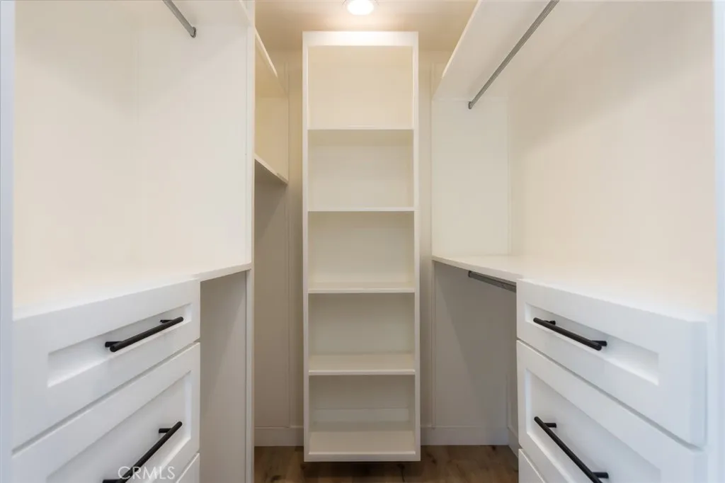 walk-in closet in primary bedroom