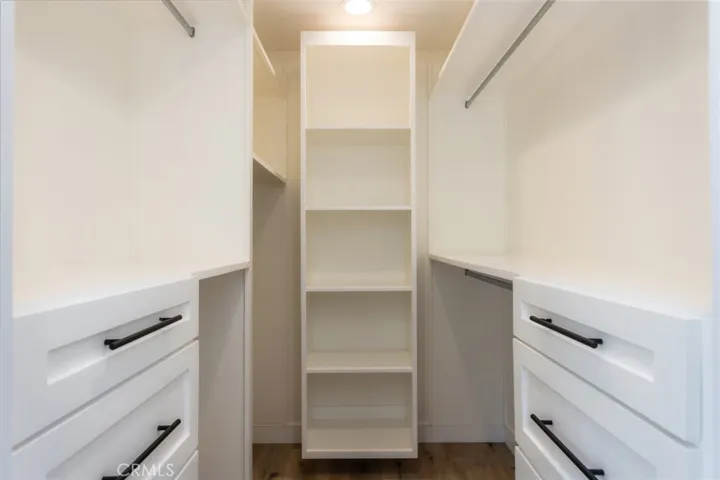 walk-in closet in primary bedroom