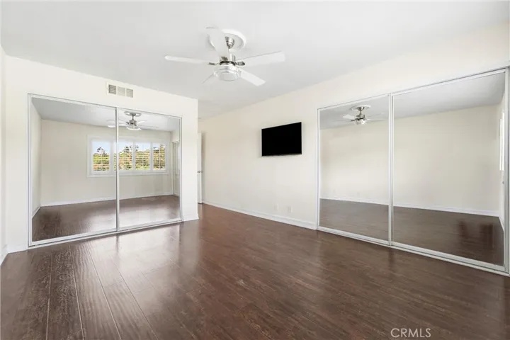 Primary Bedroom with Double mirrored closets