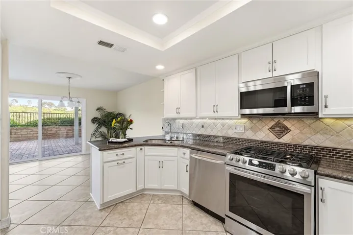 Open Kitchen to Dining area and Patio
