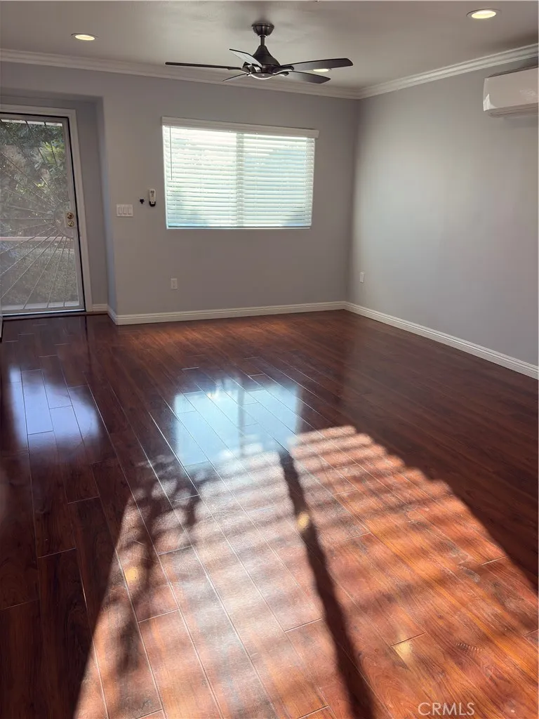 spacious living room with split wall unit
