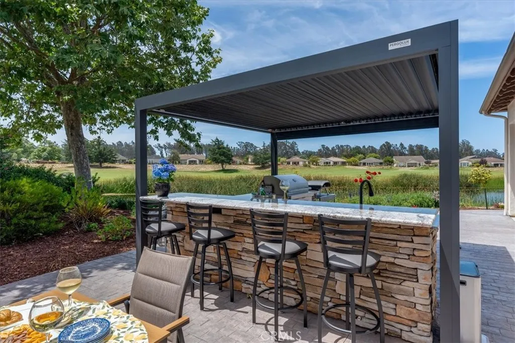 Newly Built Outdoor Kitchen With Lighted & Motorized Cover
