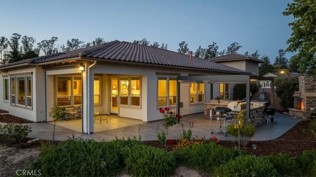 Beautiful Landscaping and Plenty of Ambiance Invite You Inside