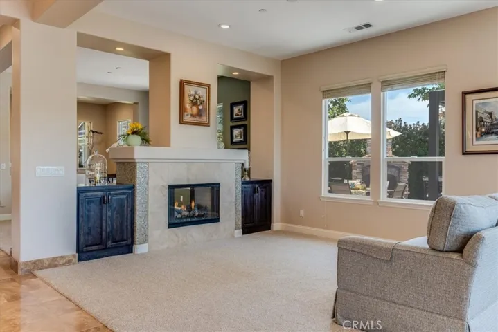 Living Room/Gathering Nook With Romantic Fireplace