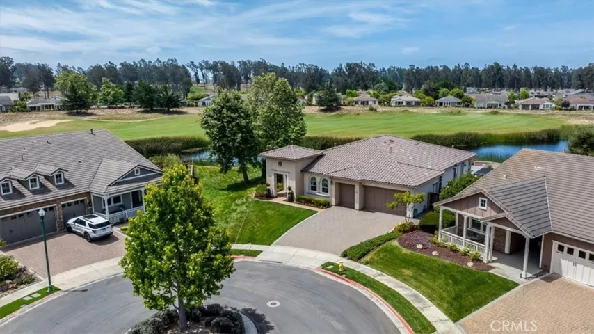 Overhead View of End of Small Cul-de-Sac Street With Backdrop of the 13th Fairway and Lake