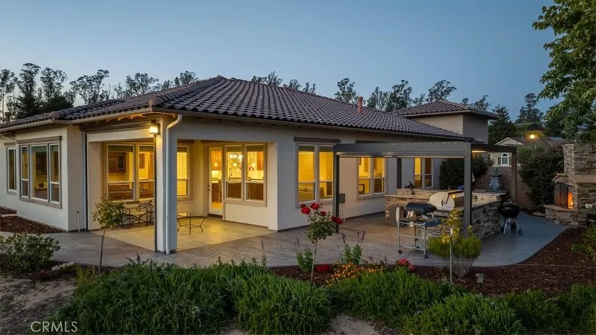 Beautiful Landscaping and Plenty of Ambiance Invite You Inside