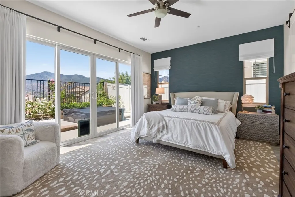 a ton of natural light in primary bedroom