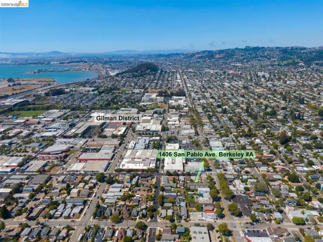 Aerial overview showcasing dense urban development with commercial and residential properties