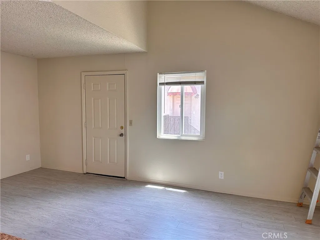 Living room with vaulted ceiling