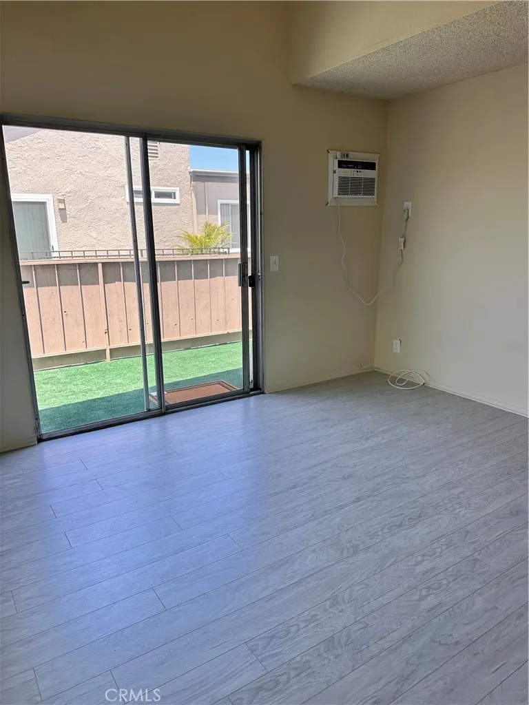 Primary Bedroom with sliding door to balcony