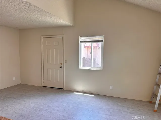 Living room with vaulted ceiling
