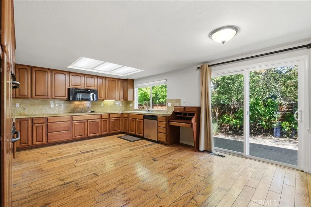 Kitchen Opening To Sliding Doors to Back Yard