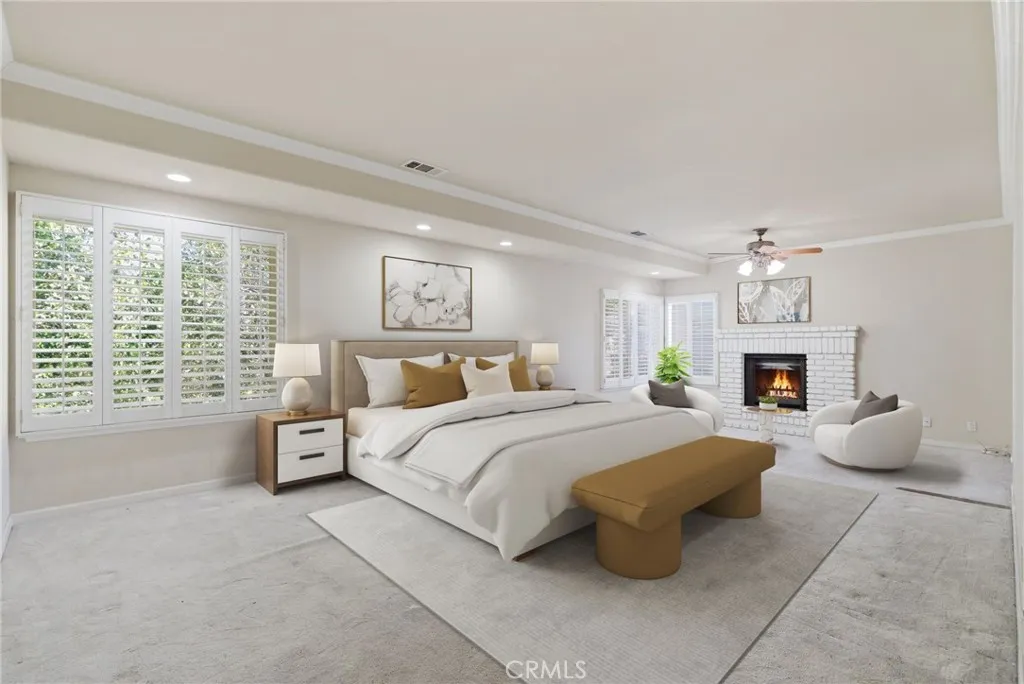 Primary Suite - Bedroom with Fireplace - Staged