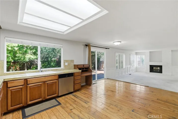 Kitchen with Adjacent Family Room with Ample Natural Light