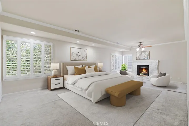 Primary Suite - Bedroom with Fireplace - Staged