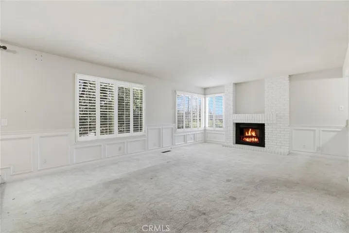 Family Room - Beautiful Fireplace and Backyard Views