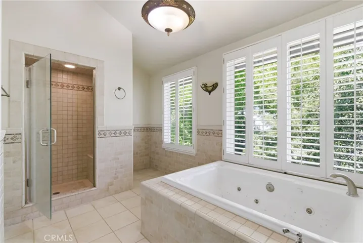 Primary Suite - Spacious Bathroom Over Looking Backyard