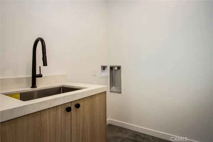 Laundry room with sink