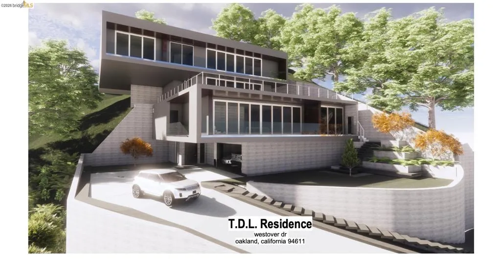 Back of house featuring a balcony and a patio area