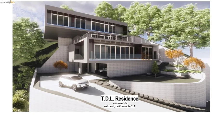 Back of house featuring a balcony and a patio area