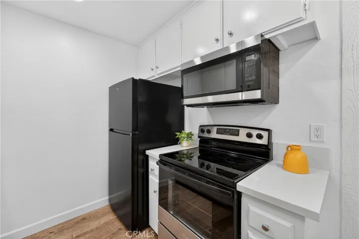 Includes fridge and microwave
