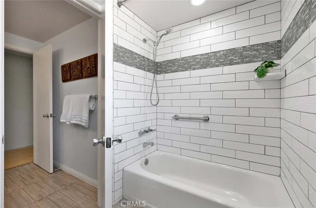 Tub with shower.
