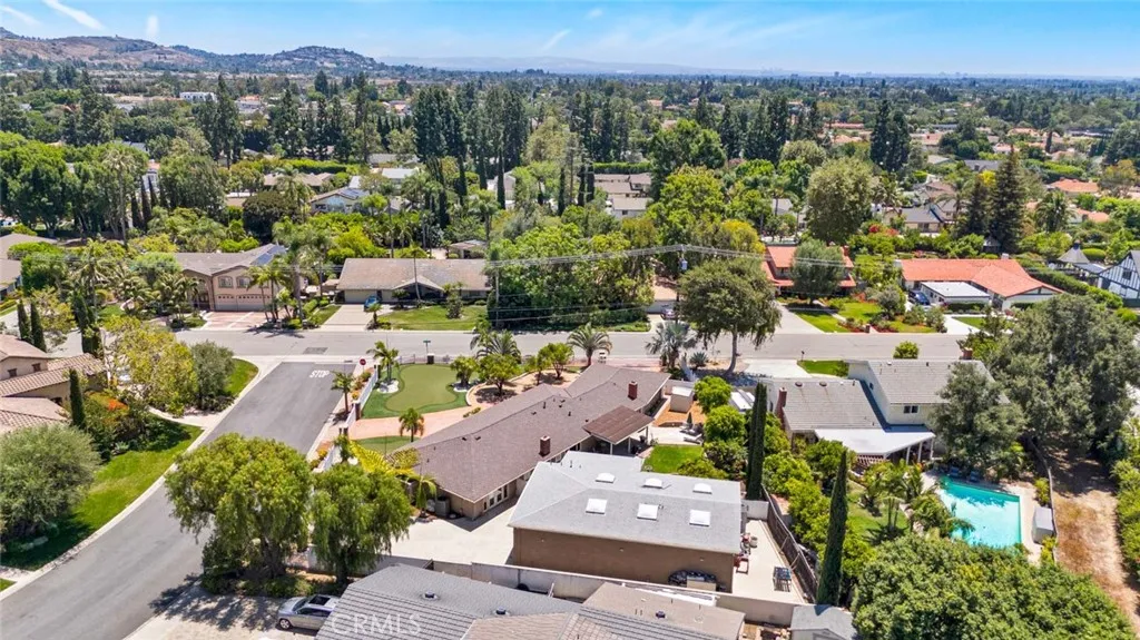 Prime corner location showing single story home and 1500 separate garage with 6 large skylights.