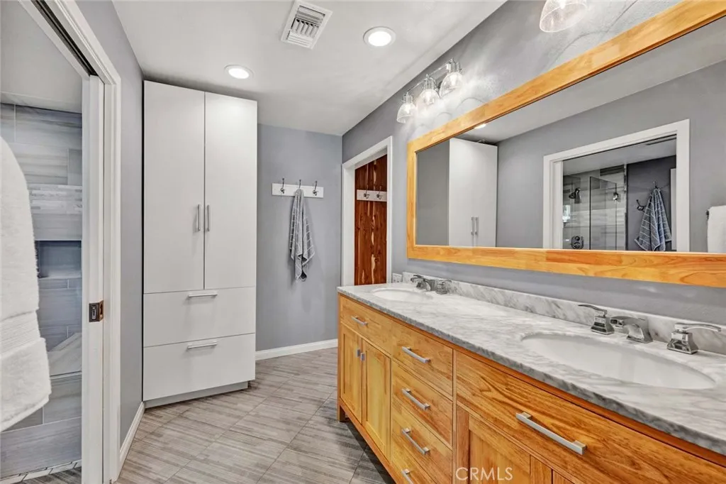 Primary bath with two sinks.