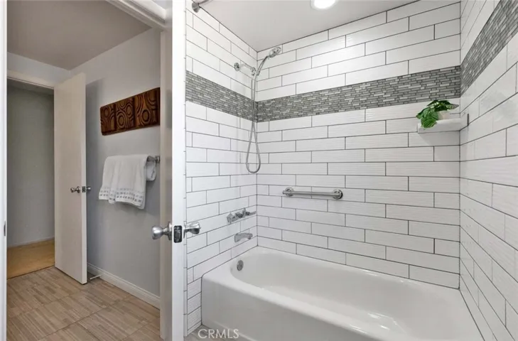 Tub with shower.