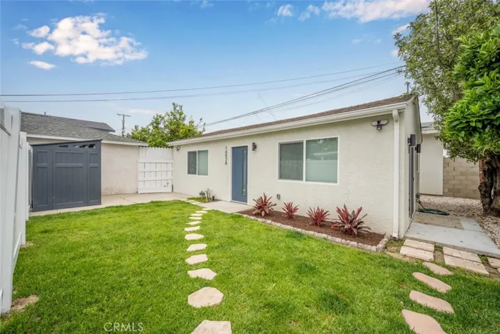 Storage shed included!
