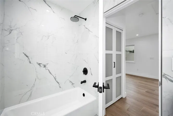 Features shower-in tub
