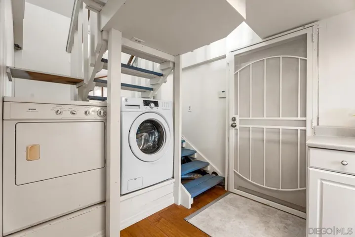 Shared laundry in ADU.