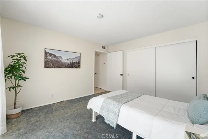 Downstairs bedroom leads to backyard