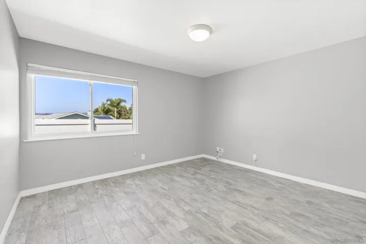 The third bedroom is extremely private separated from the primary and the second bedroom.