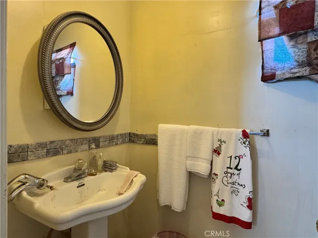 1/2 bath inside of detached garage with permit.
