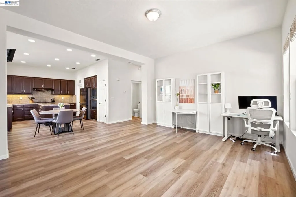 NEWER DOWNSTAIRS LAMINATE FLOORING