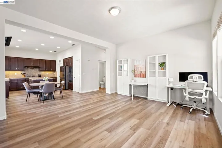 NEWER DOWNSTAIRS LAMINATE FLOORING