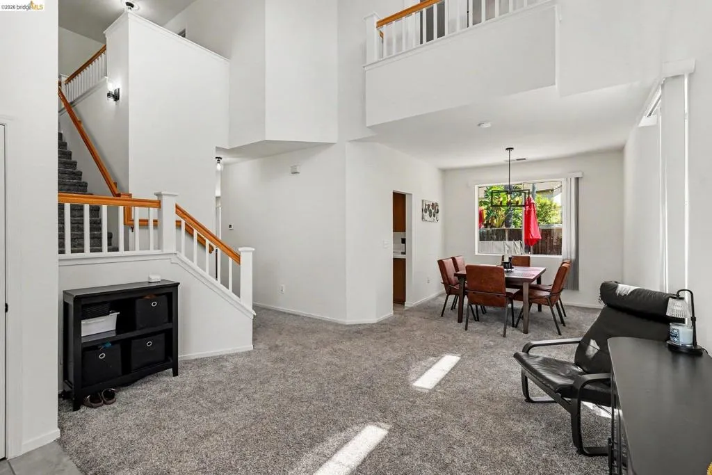 Living Dining Room with Soaring Ceilings
