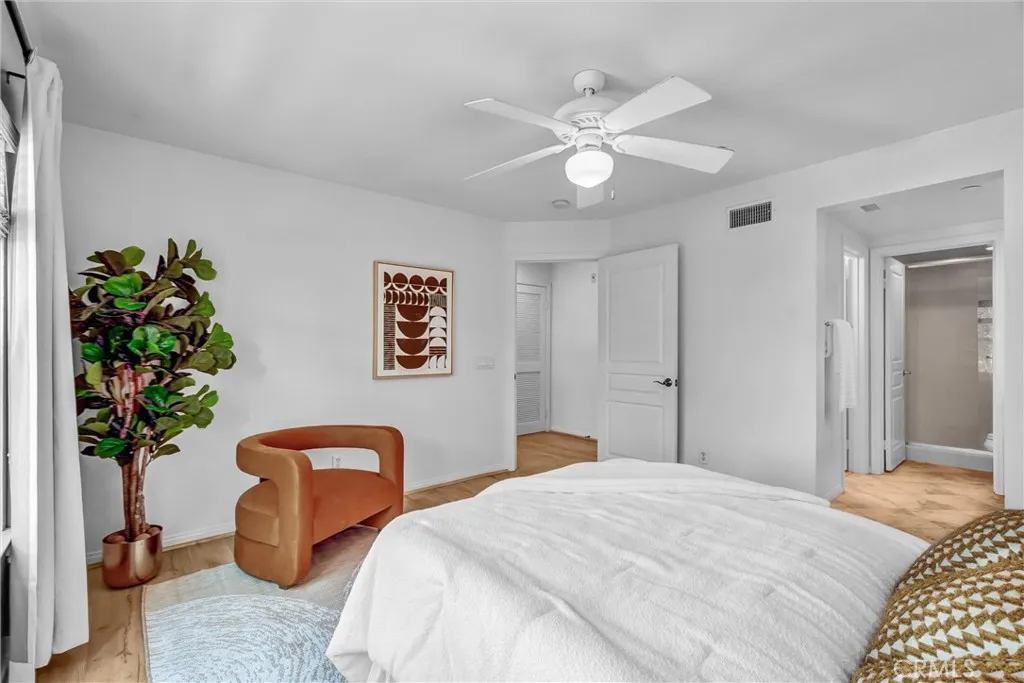 Primary Bedroom with Walk-in Closet, Private Walk-in Shower and Dressing Area with Dual Sinks