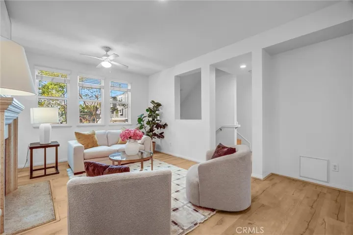 Living Space on Mid-floor with Powder Room access and located next to kitchen for easy entertaining.