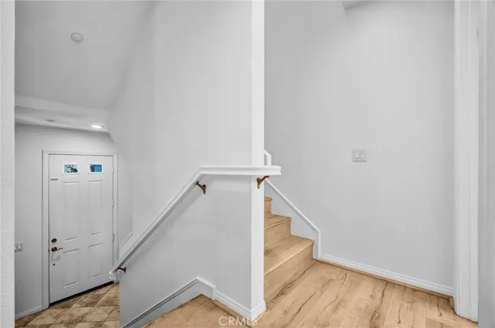 Staircase leads to Main Floor area, downstairs or Upstairs to Main Sleeping Area