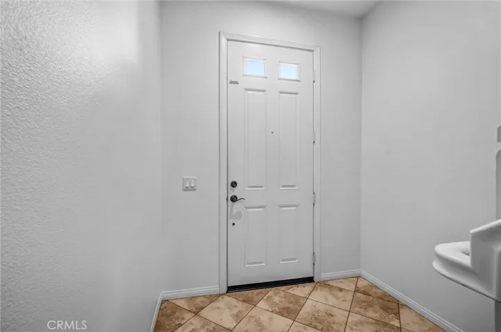 Front Entry Door with access to downstairs Office or stairway to main level.