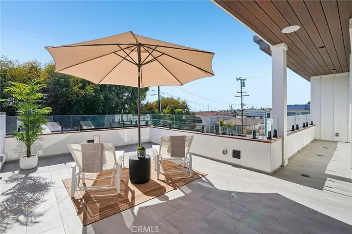 Balcony off office/nursery with stairs leading to rooftop ocean view deck