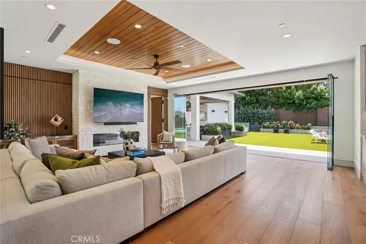 Living room opens to enormous backyard