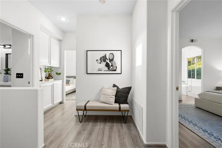 Lovely hallway leading to two secondary bedrooms, secondary bathroom and upstairs laundry room